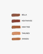 Seint Bronzer shade comparison, five cream swatches labeled Bella, Heatwaves, High Tide, Tanlines and Xanadu