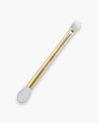 Seint Blend Brush in gold with a large wispy tapered head and a small dense dome end for blurring makeup