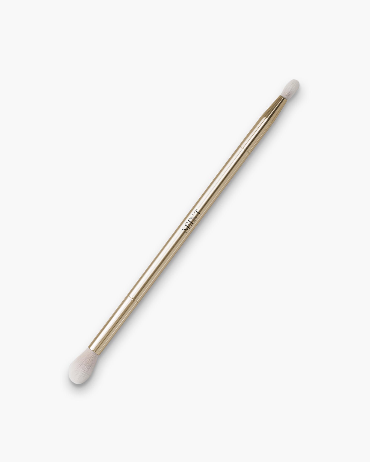 Seint Bright Brush in gold — double-ended metal handle with tapered white bristle tips in two sizes