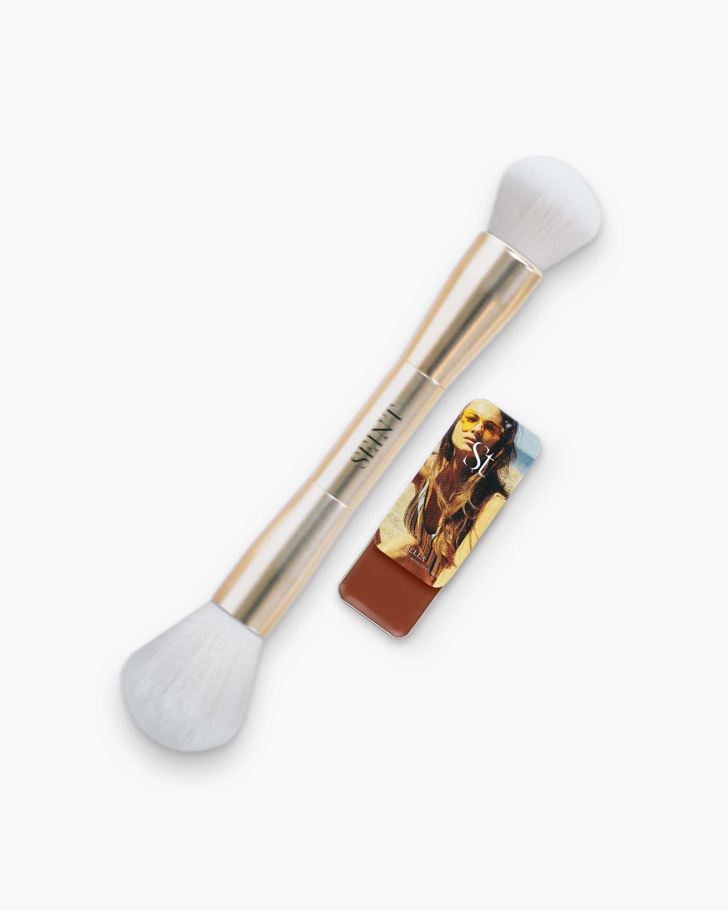 Seint Bronzer Bundle with Bella cream bronzer in rich reddish brown, shown beside the gold Blush + Bronzer Brush