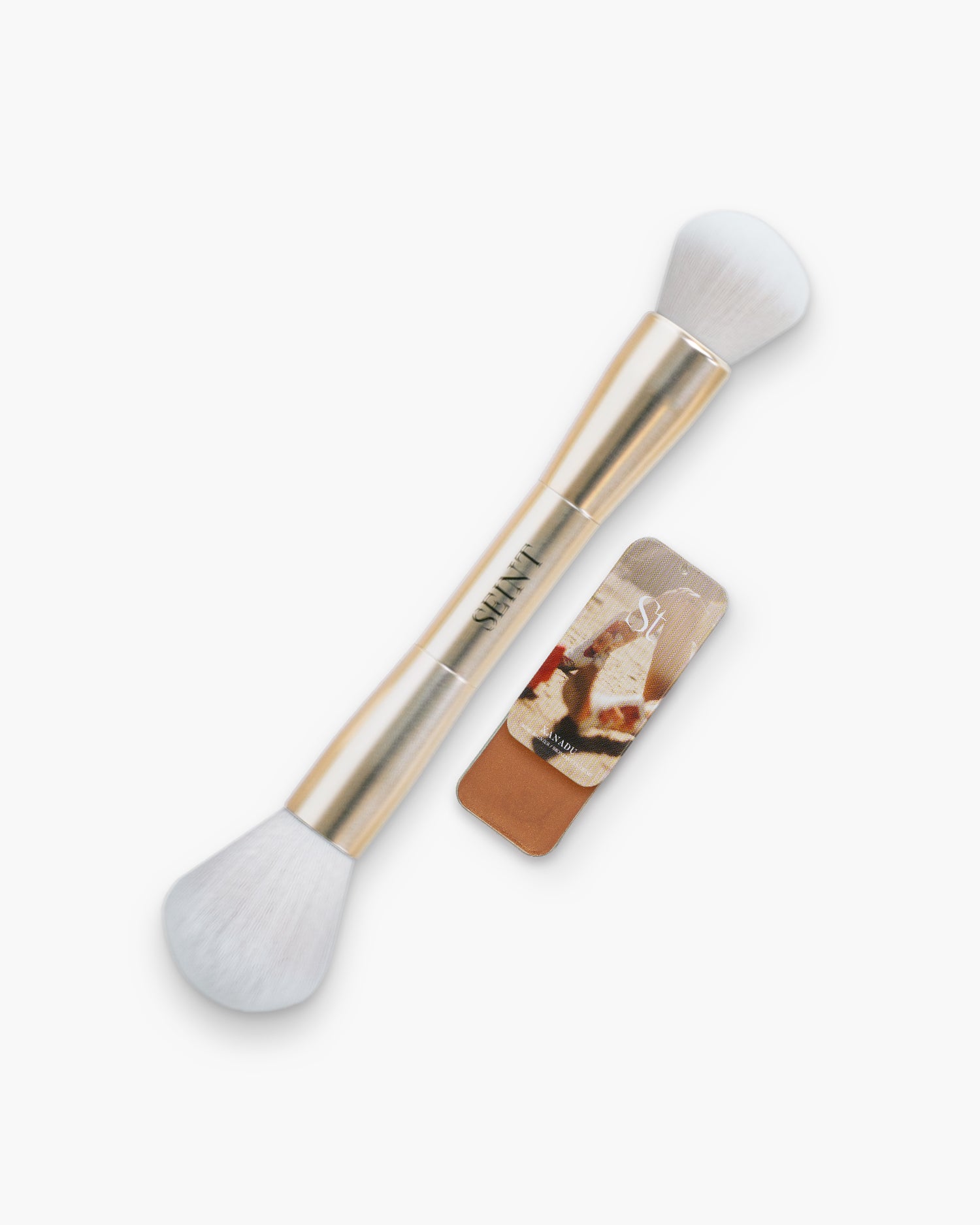 Seint Bronzer Bundle featuring Xanadu cream bronzer in shimmering golden bronze alongside the gold brush