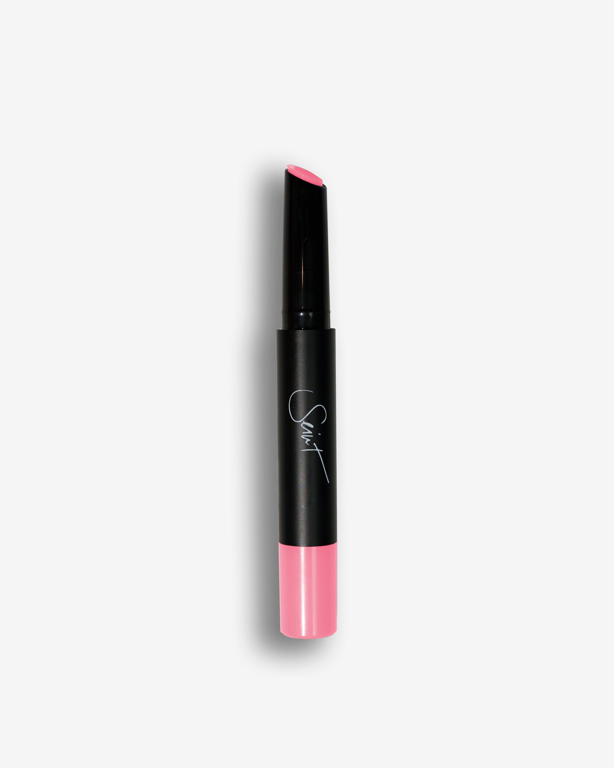 Seint Lip Gelato in Cotton Candy: angled black stick capped with bright bubblegum-pink cream