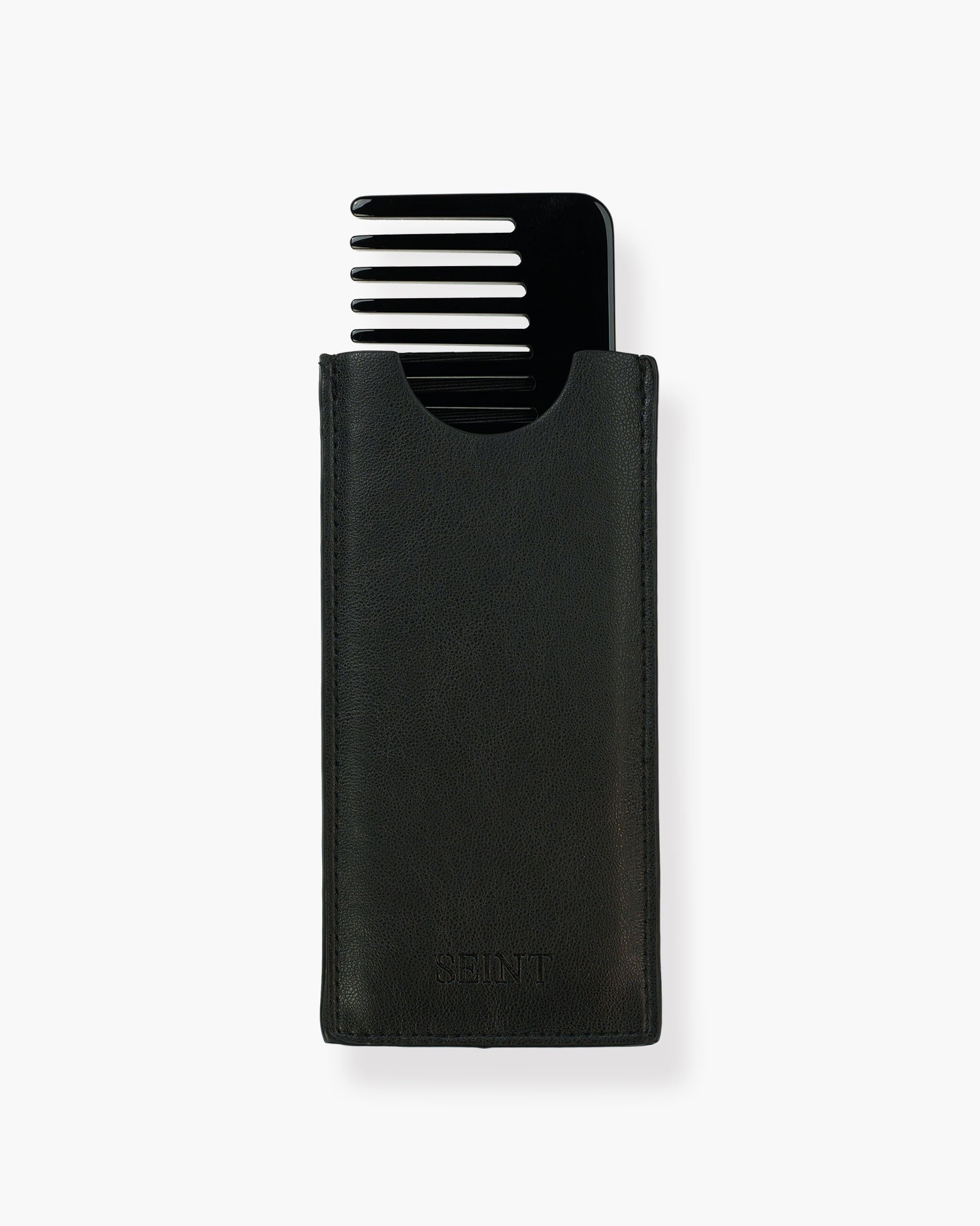 Seint Classic Comb in glossy black tucked into its SEINT-embossed black leather sleeve