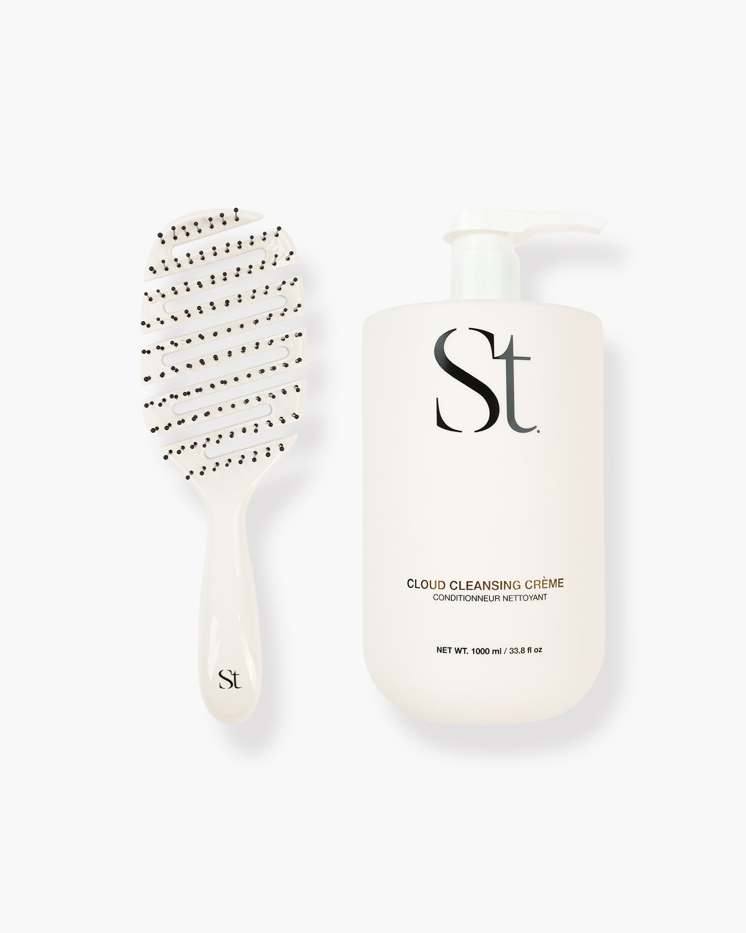 Seint Detangle Bundle pairing a white flexible vented detangling brush with a 1000 ml pump bottle of Cloud Cleansing Crème