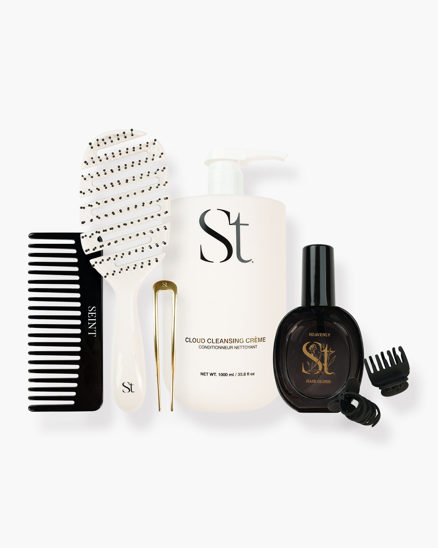 Seint Detangle Hair Bundle: comb, vent brush, gold hair pin, Cloud Cleansing Crème, Heavenly Hair Gloss, and two claw clips
