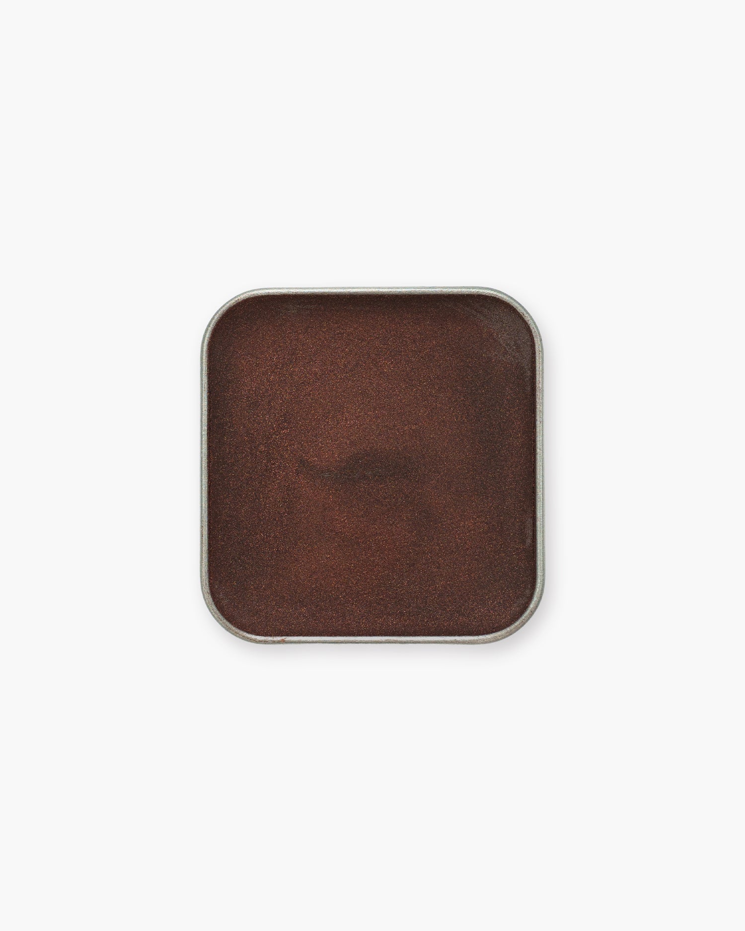 Seint Eyeshadow in Arabian Night: deep chocolate-brown cream with a reddish shimmer