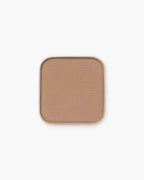 Seint Eyeshadow in Basic, a matte warm camel tan pressed in a square metal pan