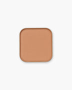 Seint Eyeshadow in Bubba — a matte warm apricot-tan pressed powder
