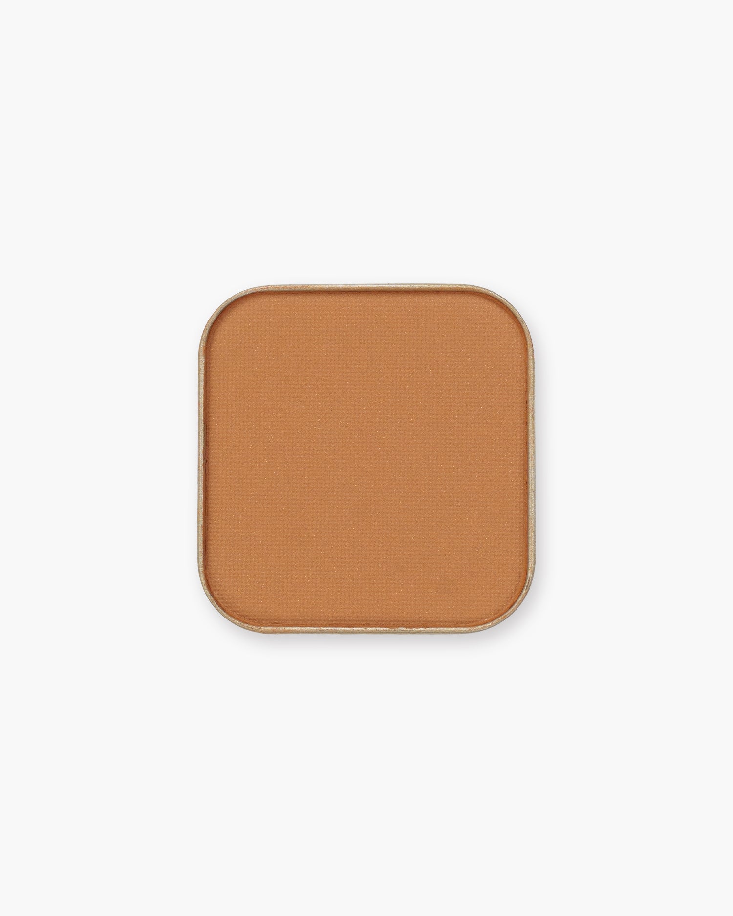 Seint Eyeshadow in Butterscotch, a matte warm amber-caramel
