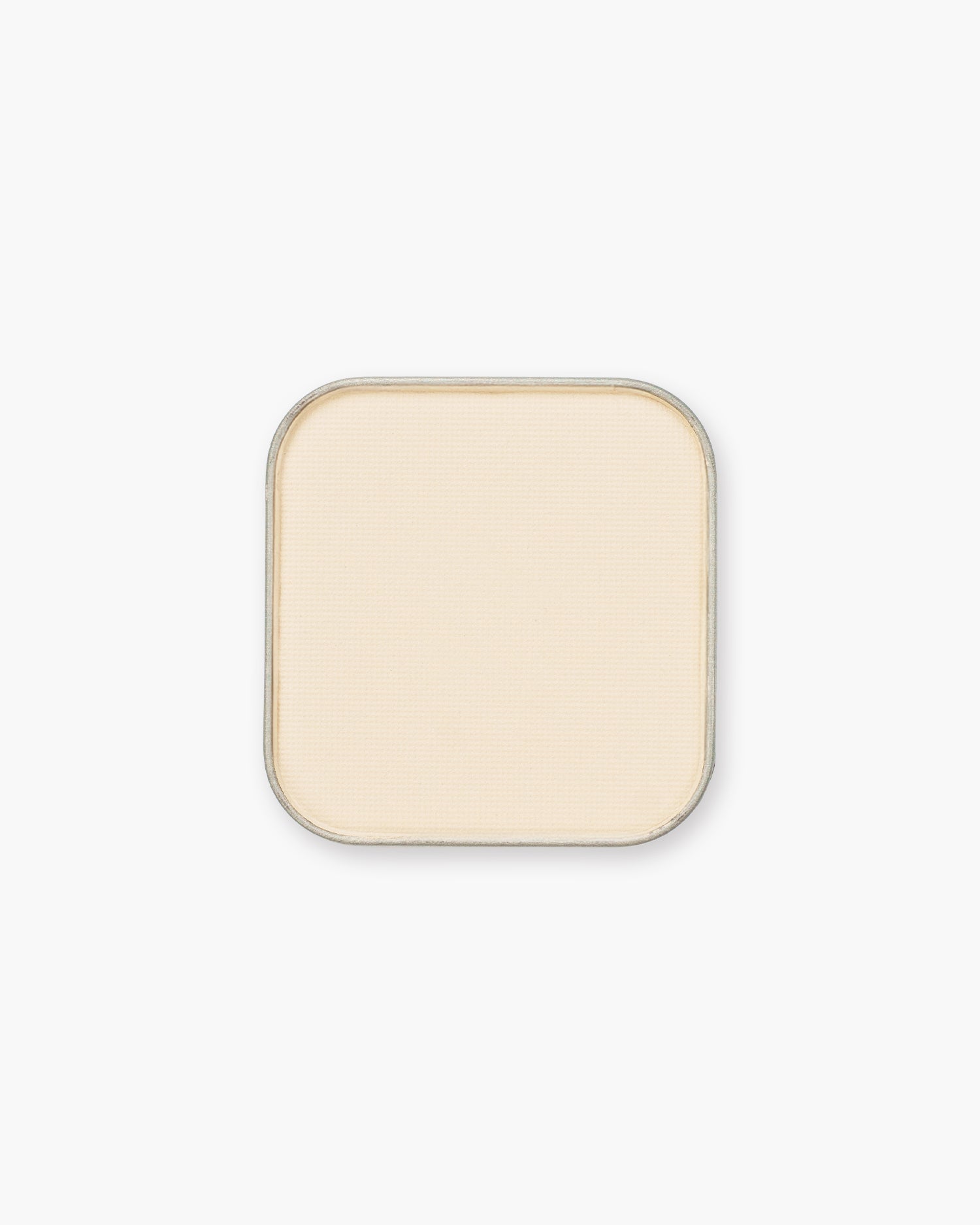 Seint Eyeshadow in Cupcake — pale ivory cream shade with a soft matte finish