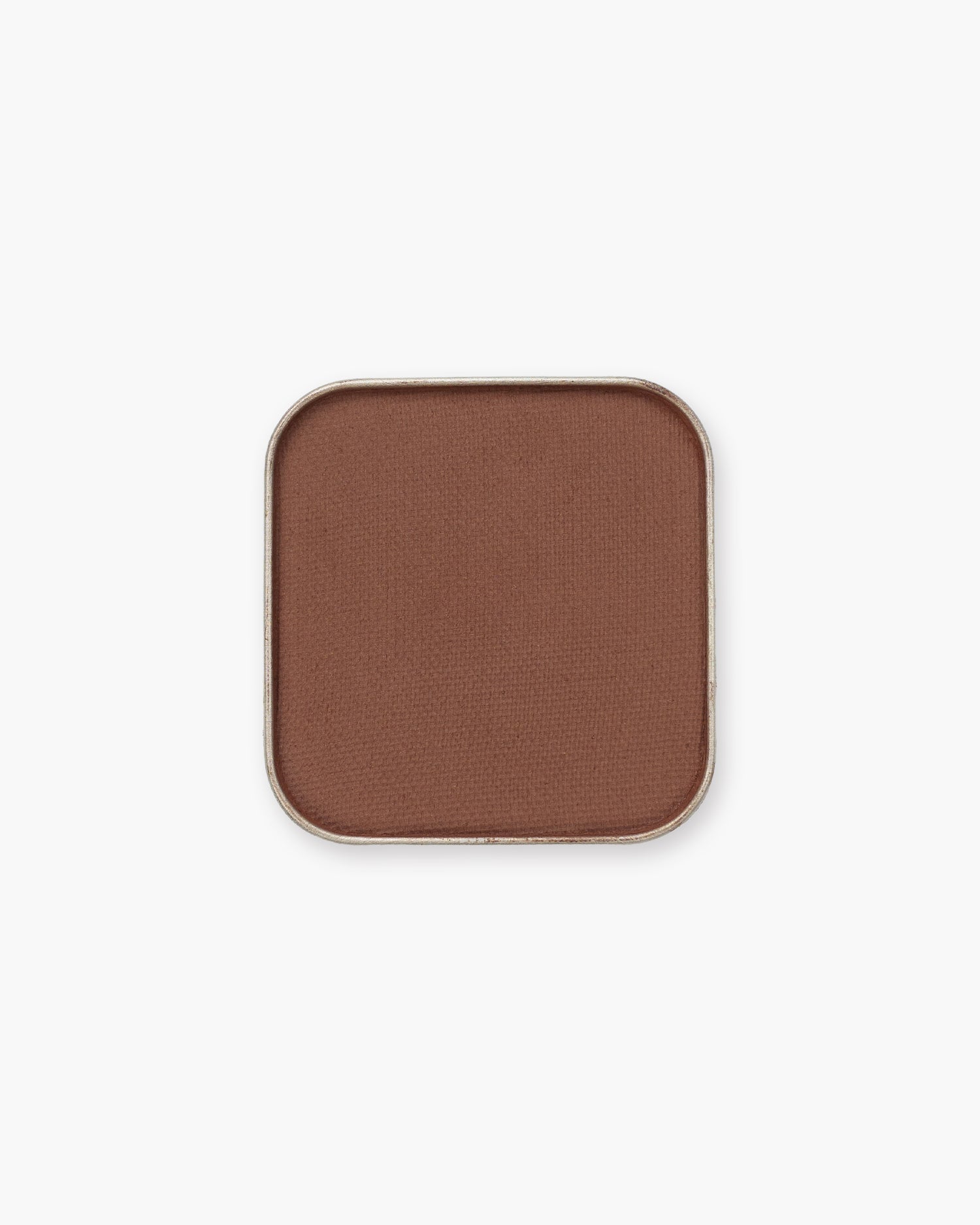 Seint Eyeshadow in Filly, a matte chestnut-cocoa brown