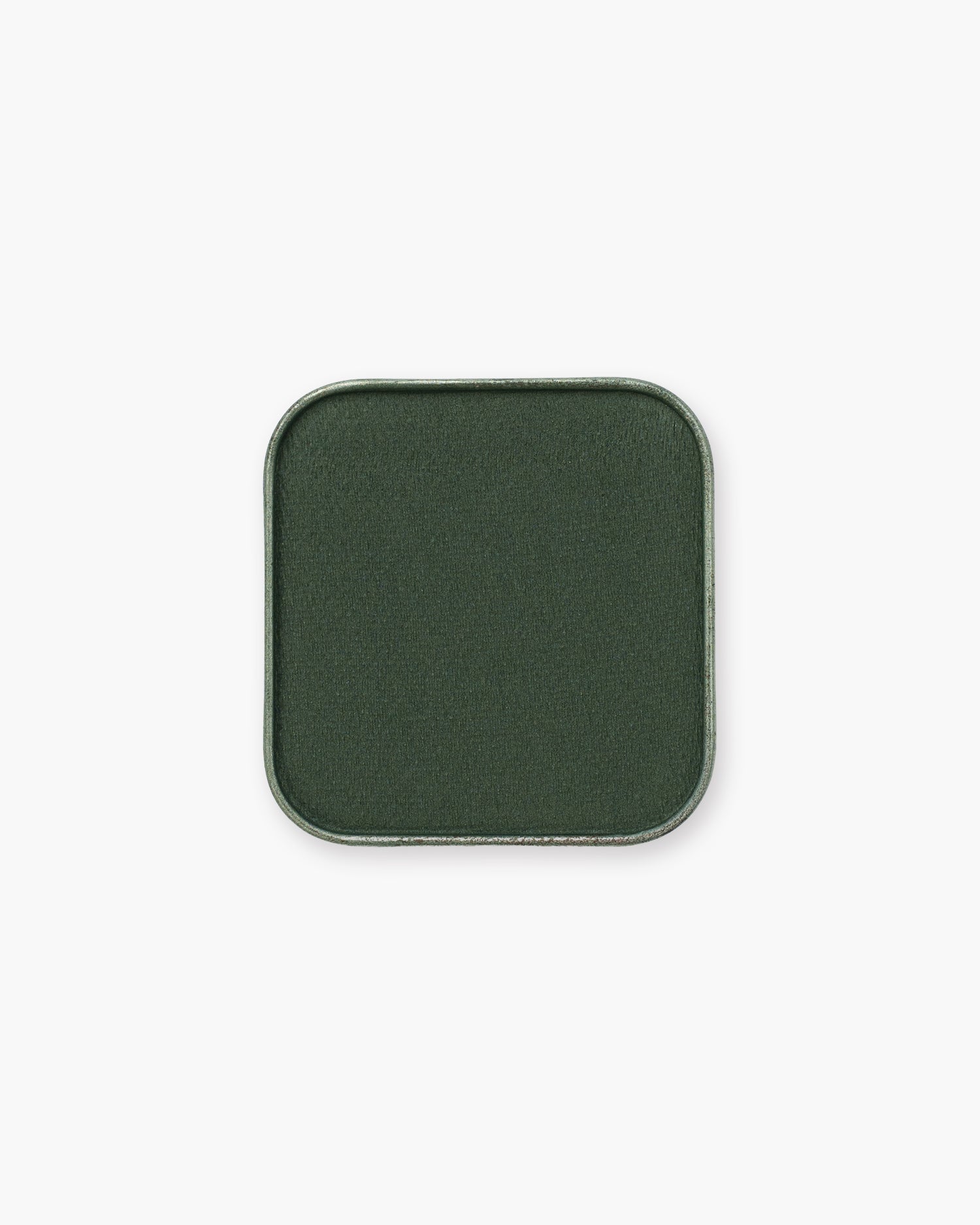 Seint Eyeshadow in Ivy League, a matte deep forest green in its pan