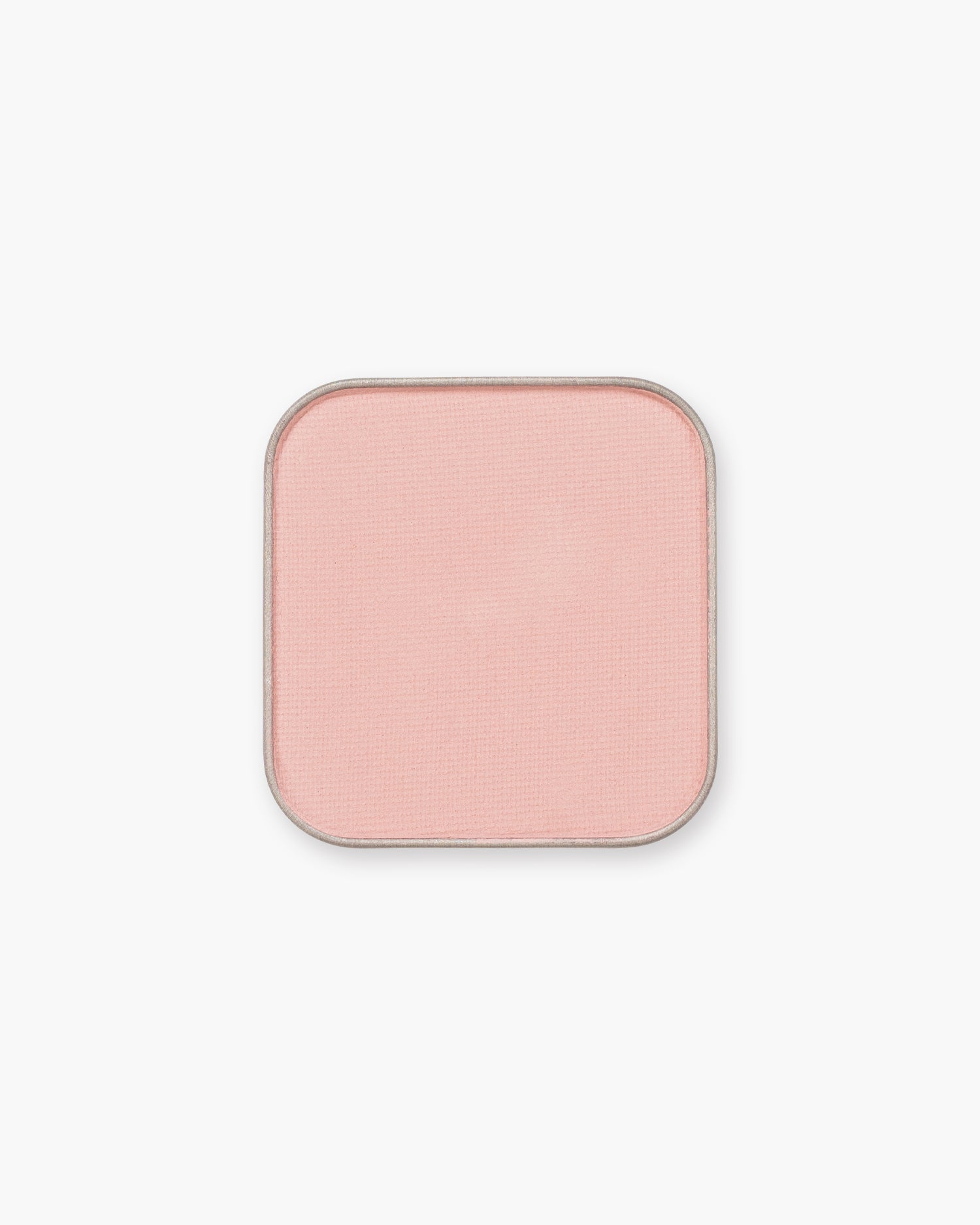 Seint Eyeshadow in Mama — a matte soft baby pink pressed powder