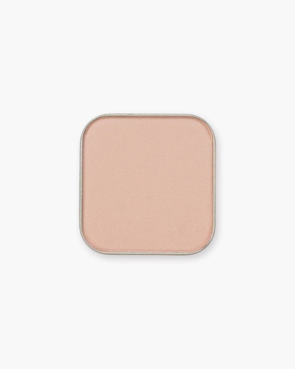 Seint Eyeshadow in Pup, a matte pale blush-nude in its metal pan