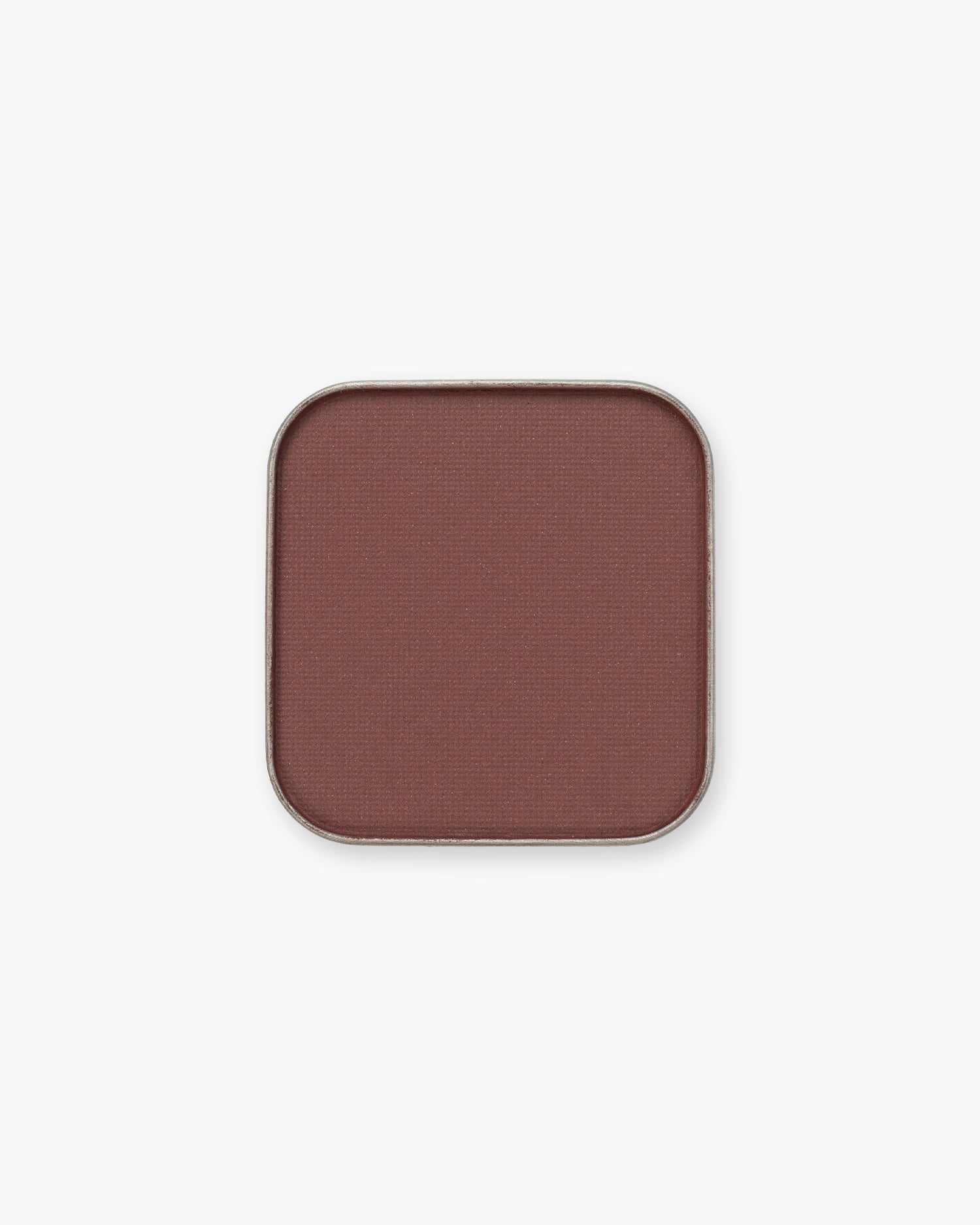 Seint Eyeshadow in Revival — a matte brick-mahogany red-brown
