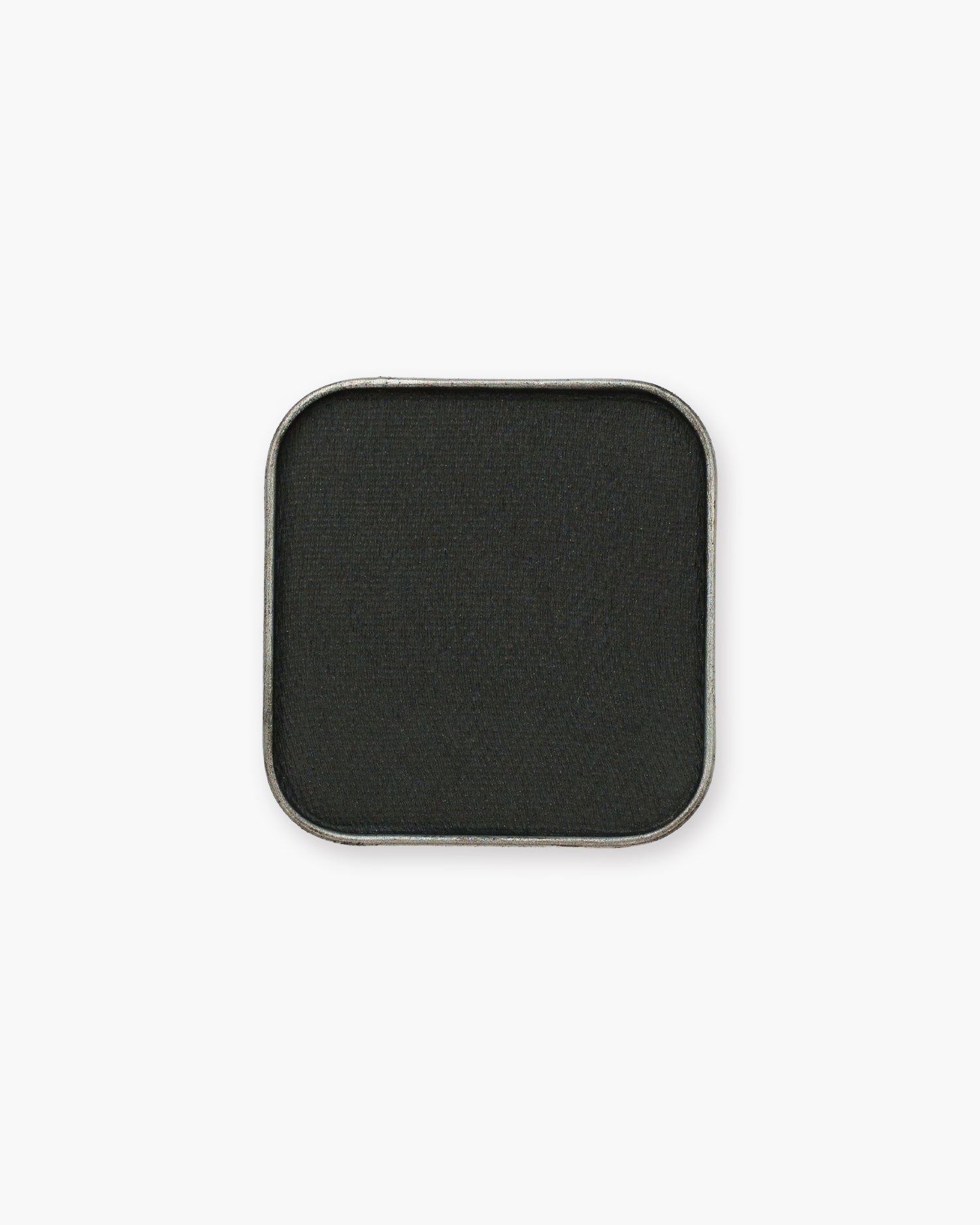 Seint Eyeshadow in Salem, a matte soft black in a square silver pan