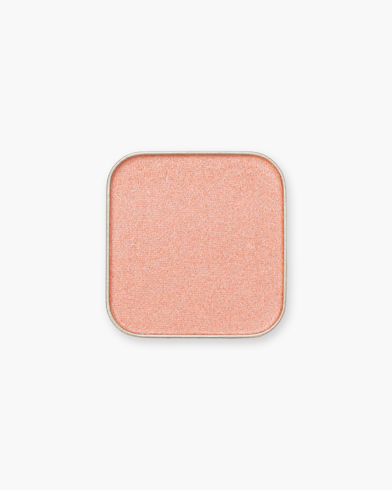 Seint Eyeshadow in On Wednesdays, a pearly pink-coral shade in its square pan