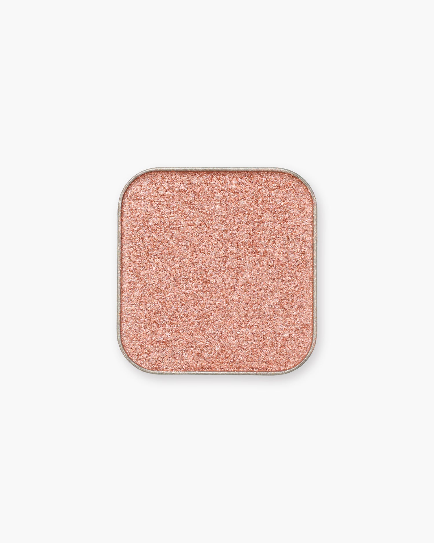 Seint Eyeshadow in Sis — peachy-pink shimmer lit with golden sparkle