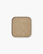 Seint Eyeshadow in Stardust glimmers in antique gold-taupe