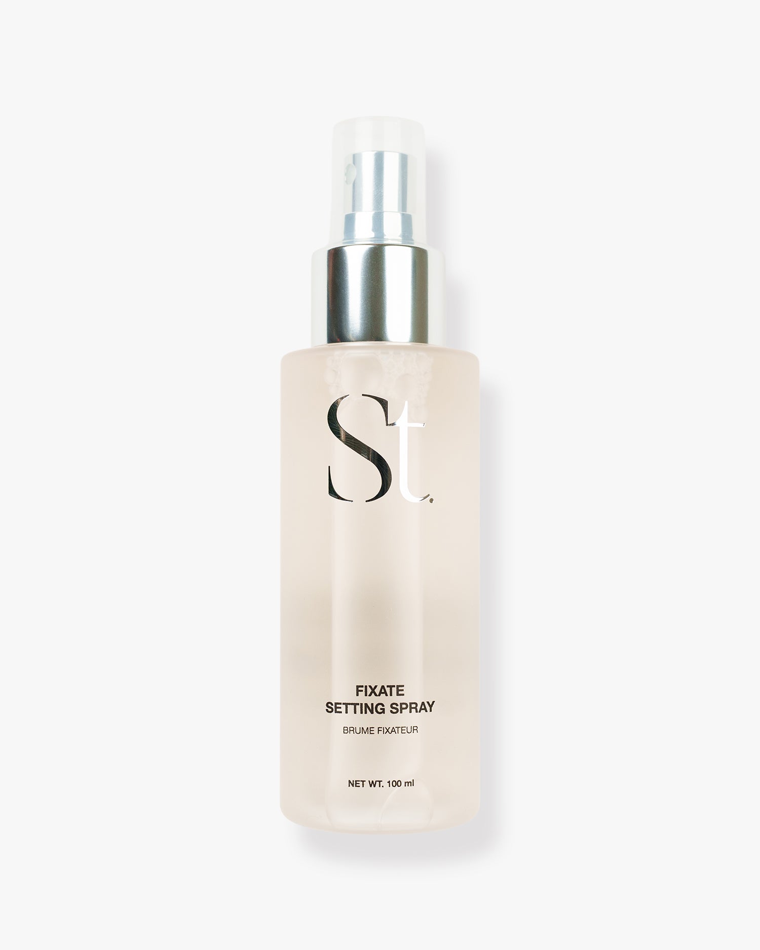 Seint Fixate Setting Spray in a frosted 100 ml bottle with silver pump and clear cap on a white background