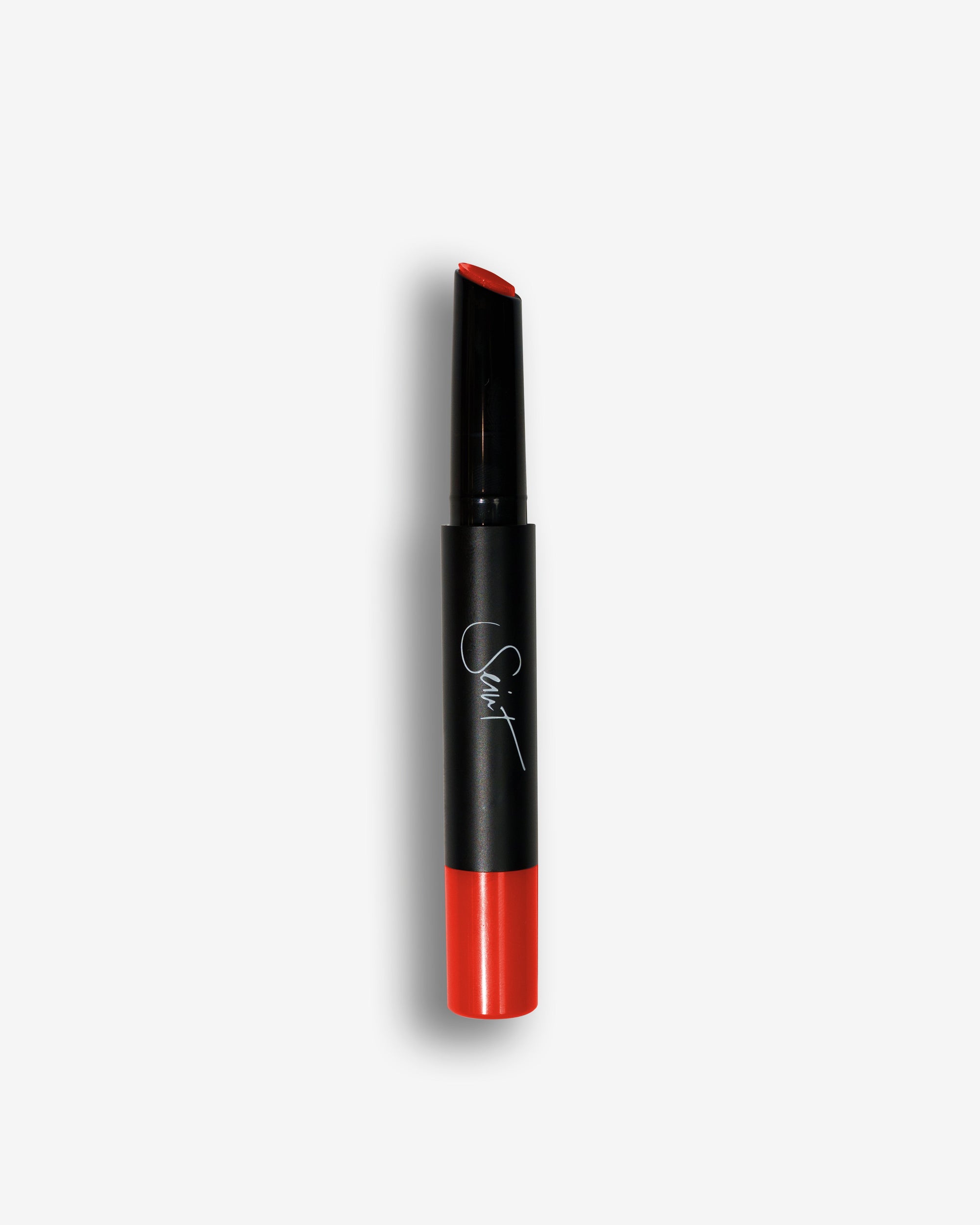 Seint Lip Gelato in Hibiscus, black tube tipped with bright orange-red cream
