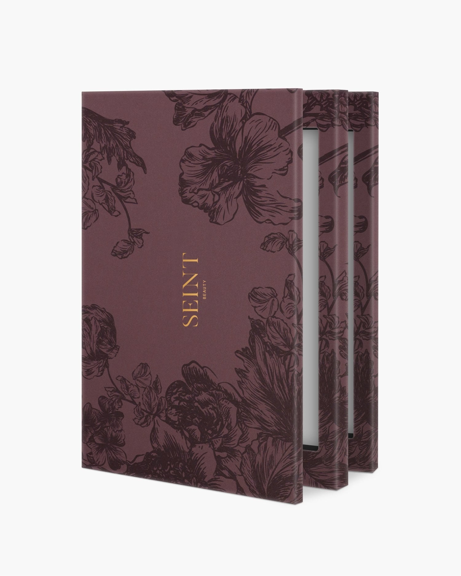 Seint IIID Palette 12 in Plum Floral, deep plum case with etched dark blooms and a gold Seint wordmark
