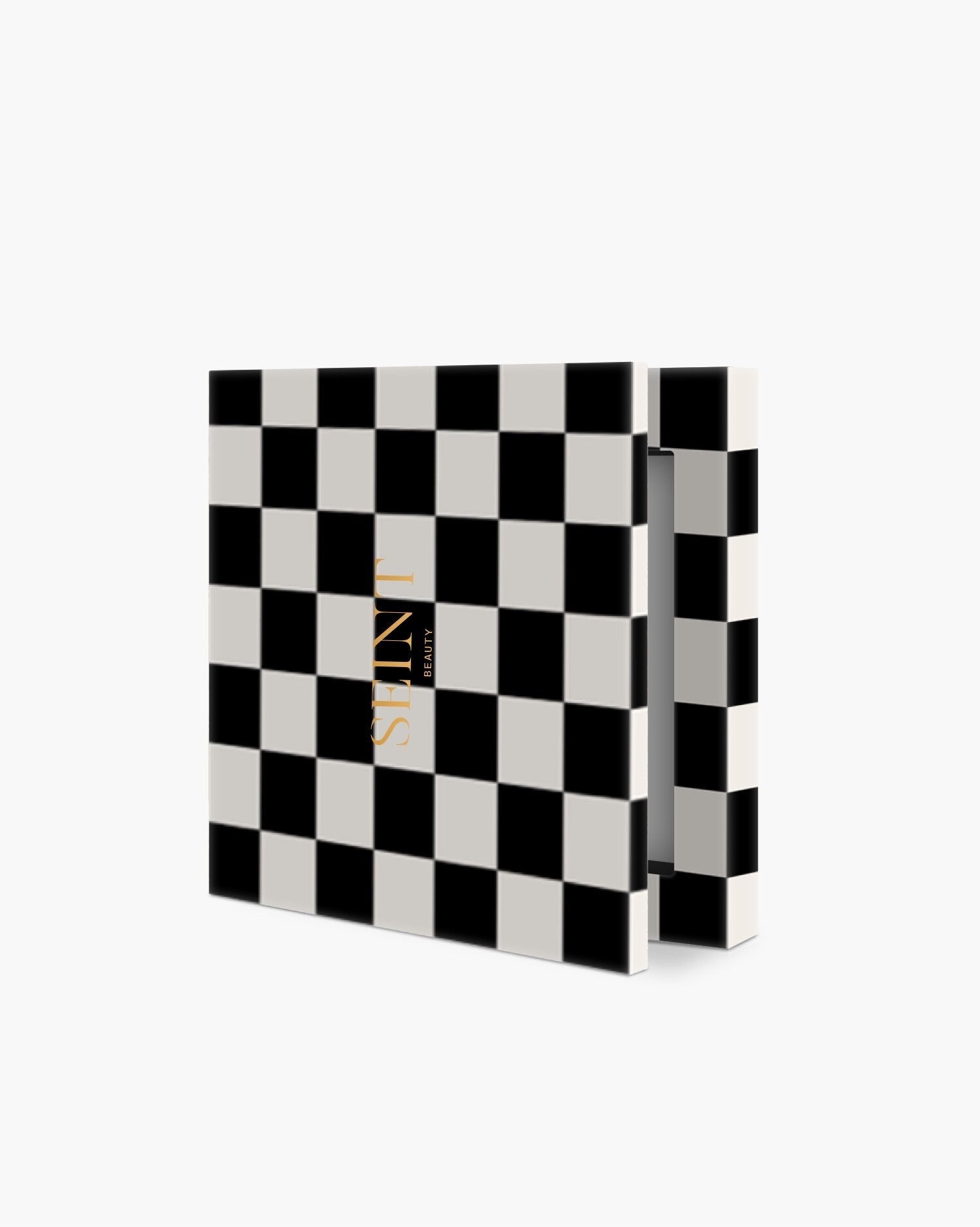 Seint IIID Palette 2 in Noir — black-and-white checkerboard compact with gold SEINT lettering, shown slightly open