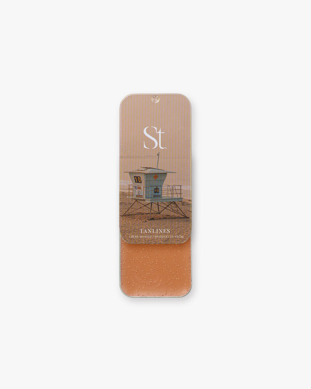 Seint Bronzer in Tanlines, slide-open tin with lifeguard tower lid art and a light peachy-tan cream