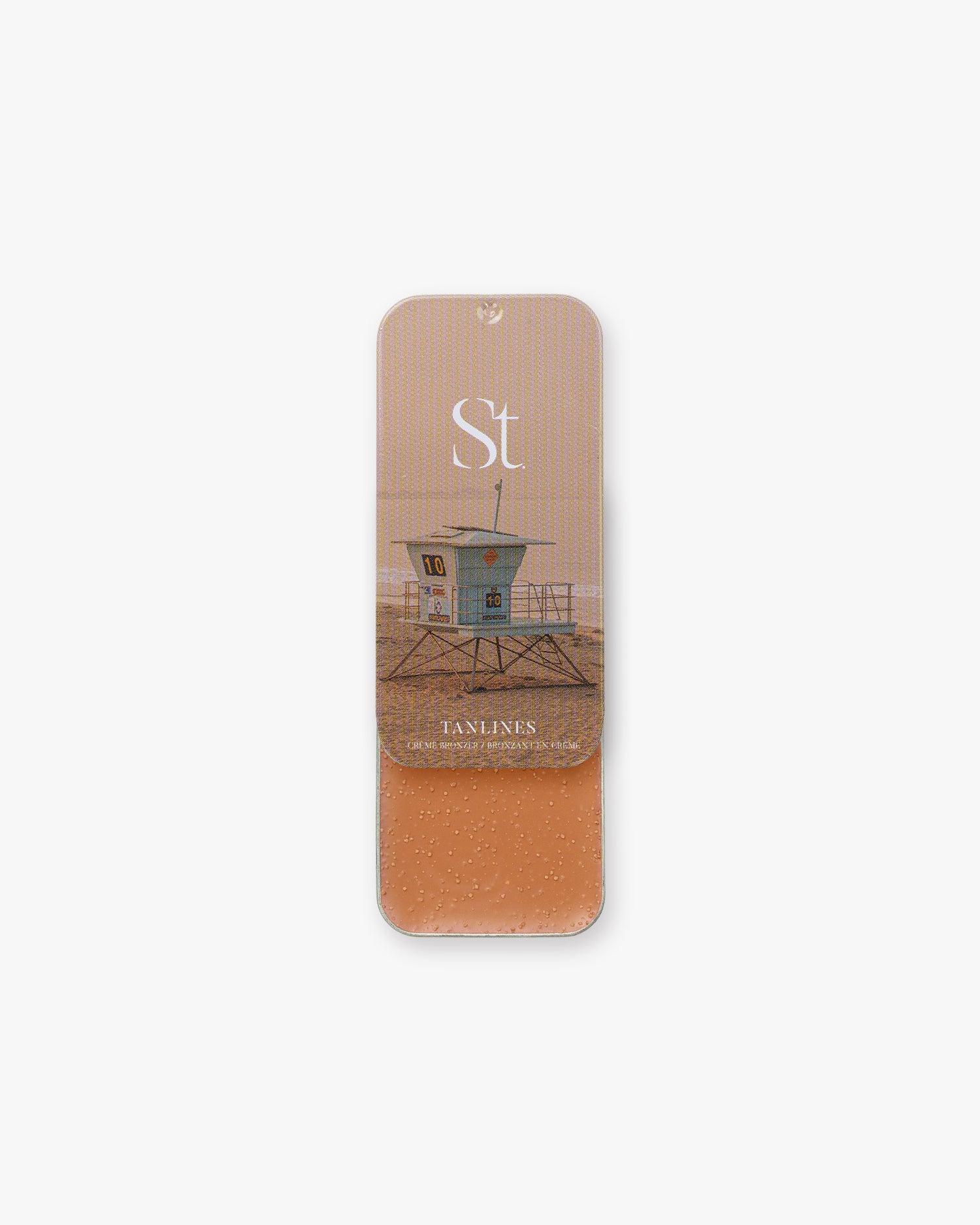 Seint Bronzer in Tanlines, slide-open tin with lifeguard tower lid art and a light peachy-tan cream