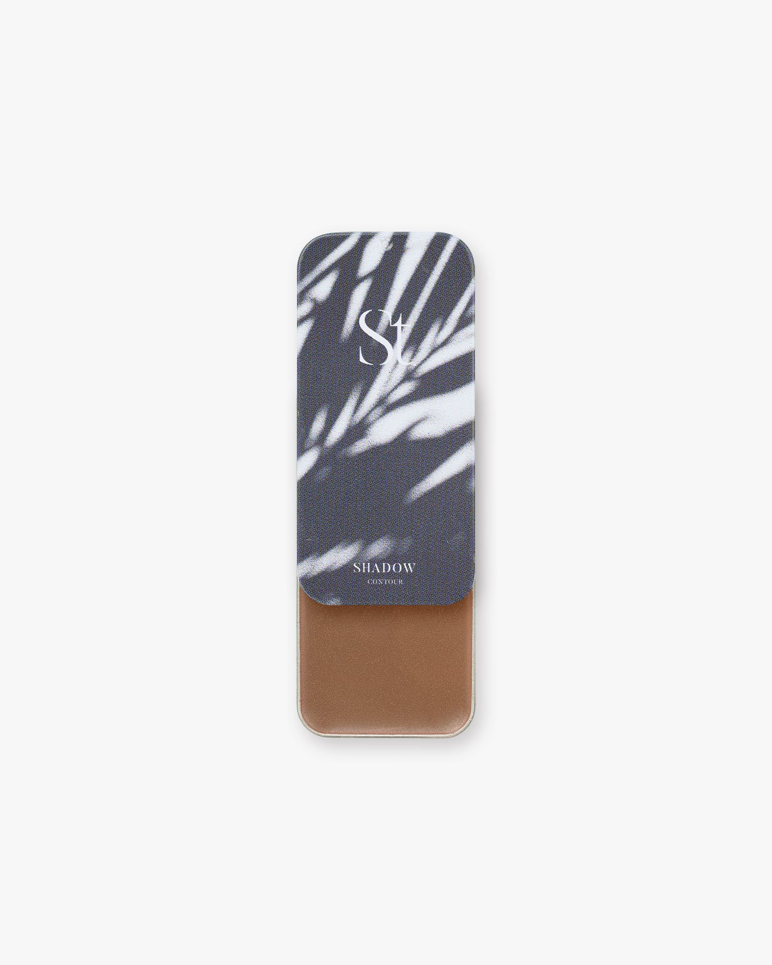 Seint Contour in Shadow: palm-frond shadow lid art with a neutral taupe-brown cream below