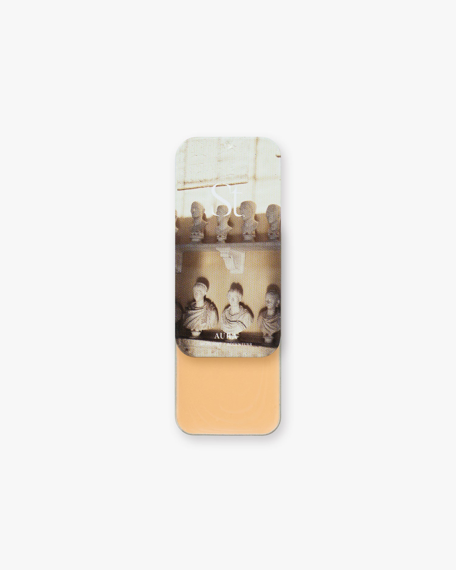 Seint Highlight in Aura, warm peach cream in a slide tin, lid picturing rows of classical marble busts