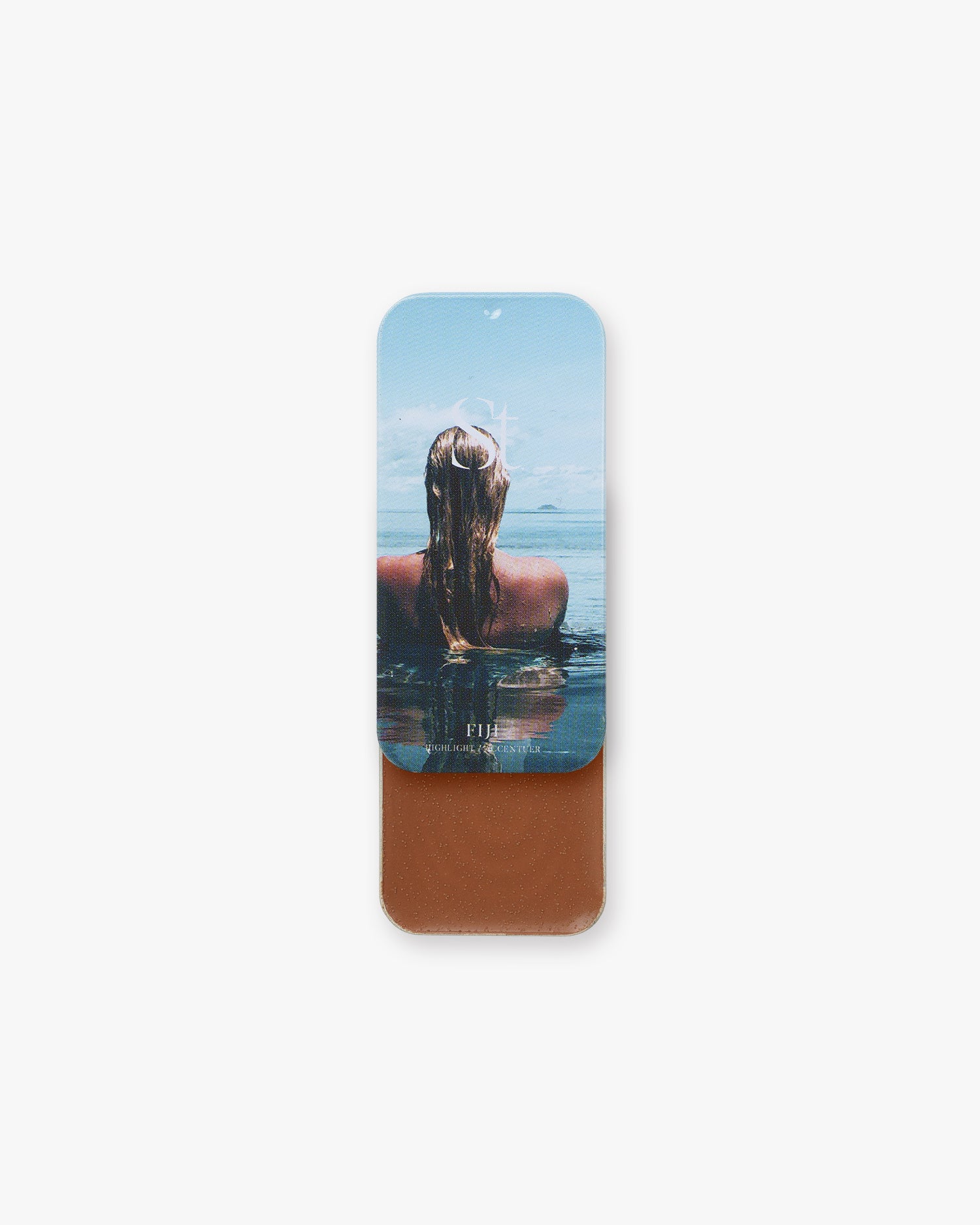Seint Highlight in Fiji: rich chestnut-brown cream under a lid of a swimmer wading in blue ocean water