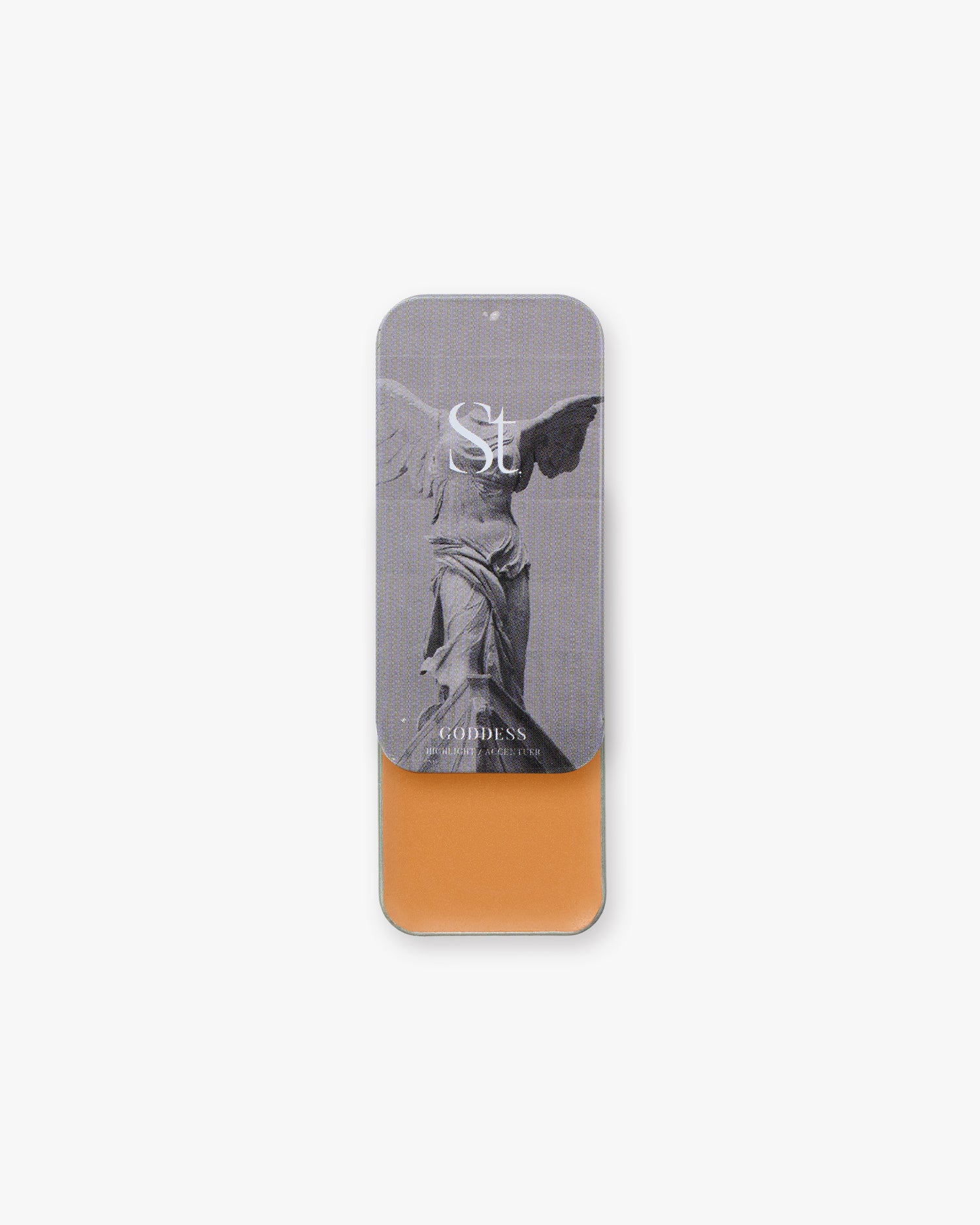 Seint Highlight in Goddess: warm copper-tan cream under a lid of the Winged Victory statue