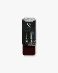 Seint Lip + Cheek in Black Cherry, gloss finish — deep blackened-burgundy cream blush in an open slide tin