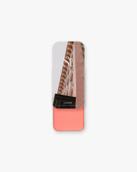 Seint Lip + Cheek in Cindy, gloss finish — open tin of light salmon-peach cream for lips and cheeks