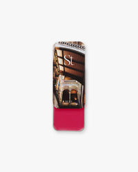Seint Lip + Cheek in Ruby, gloss finish — bright raspberry-fuchsia cream blush shown in its slide-open tin