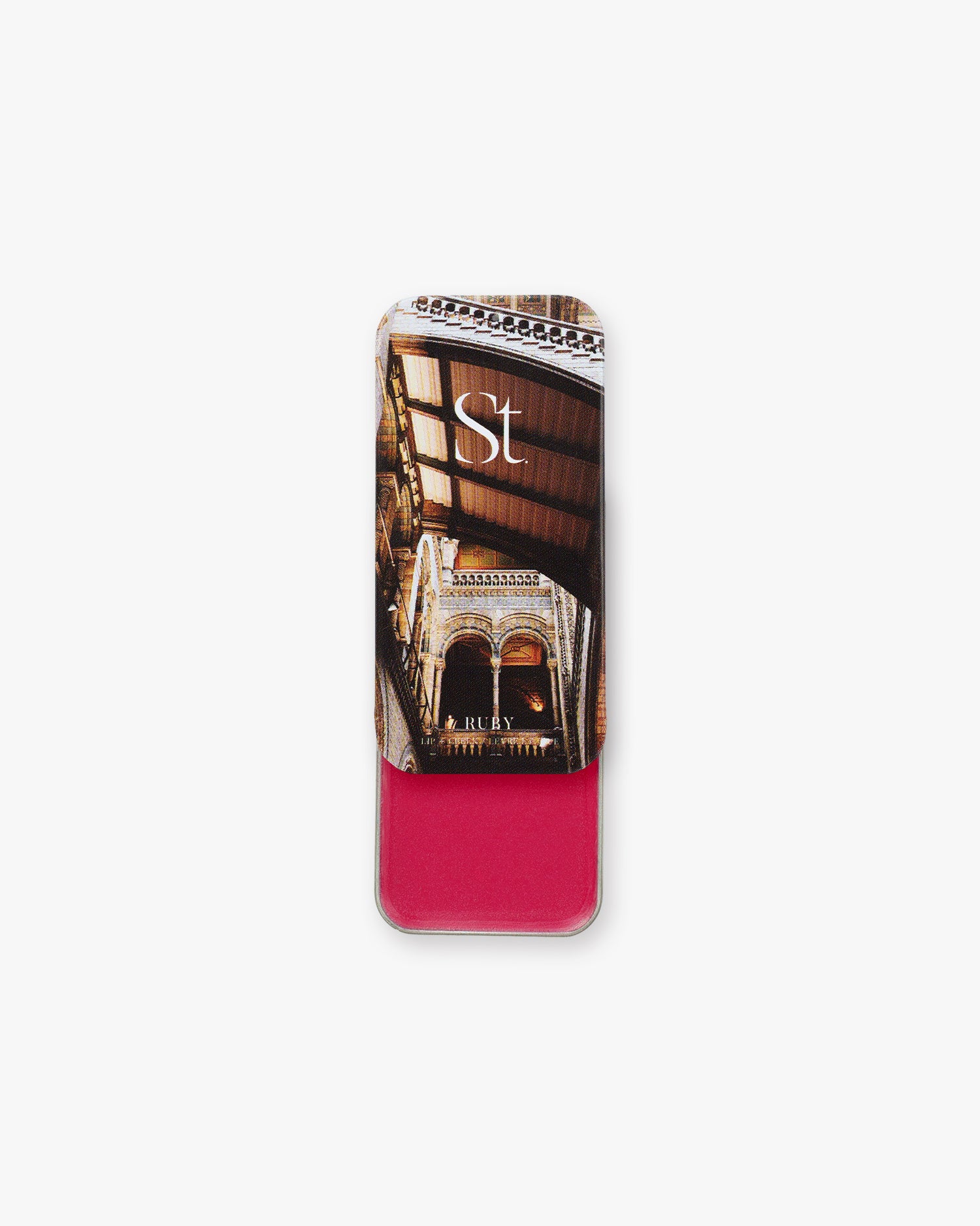 Seint Lip + Cheek in Ruby, gloss finish — bright raspberry-fuchsia cream blush shown in its slide-open tin