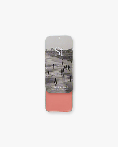 Seint Lip + Cheek in Summer Love, gloss finish — open tin of coral-pink cream blush for lips and cheeks