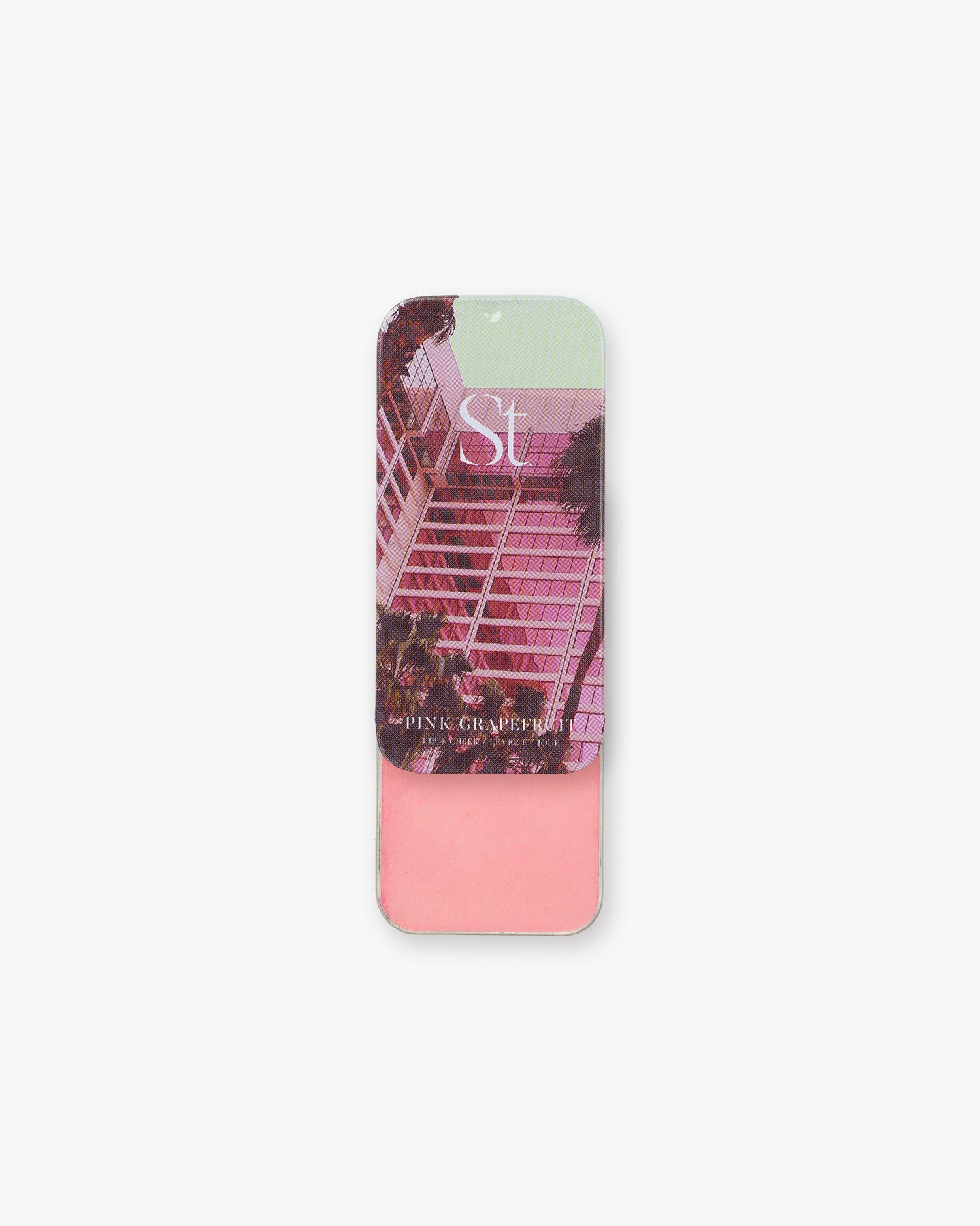Seint Lip + Cheek in Pink Grapefruit, satin finish — open tin of soft light coral-pink cream for lips and cheeks