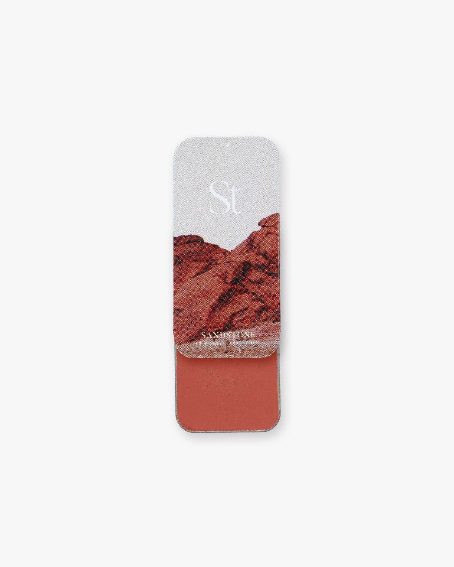 Seint Lip + Cheek in Sandstone, satin finish — open tin of muted clay-rose terracotta cream for lips and cheeks