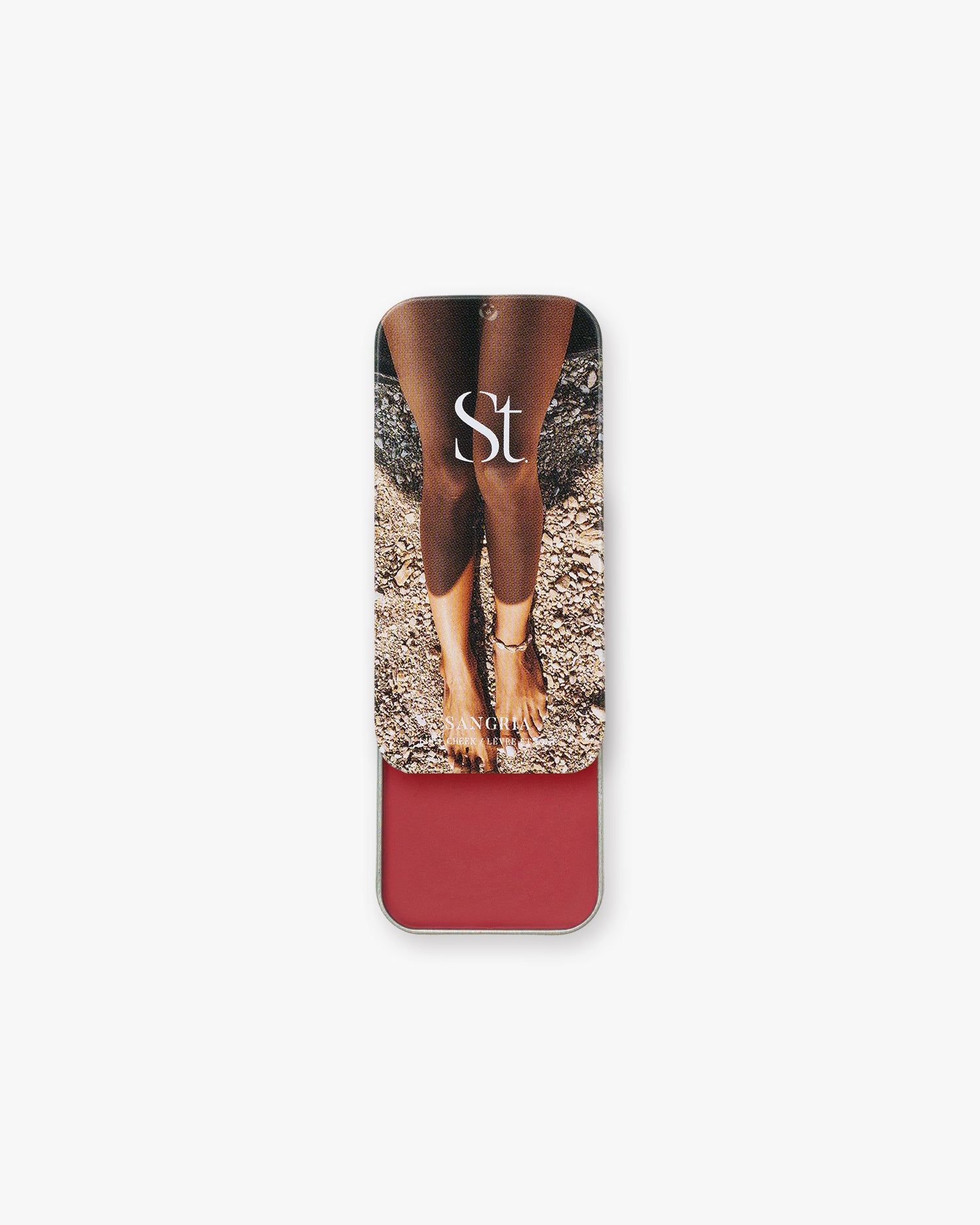 Seint Lip + Cheek in Sangria, satin finish — deep berry-red cream blush shown in its slide-open tin