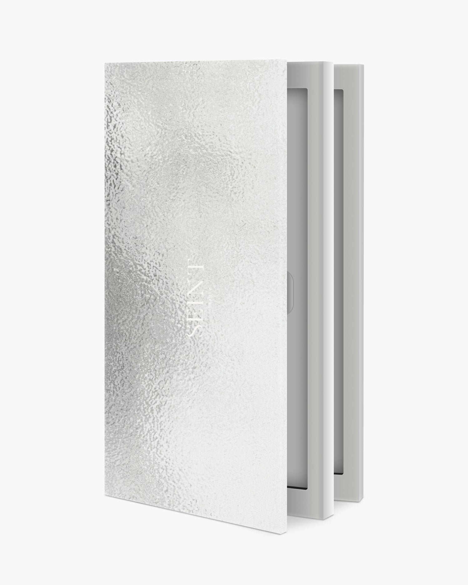 Seint IIID Palette 18 in Silver, shimmering textured foil cover standing upright with inner panels showing