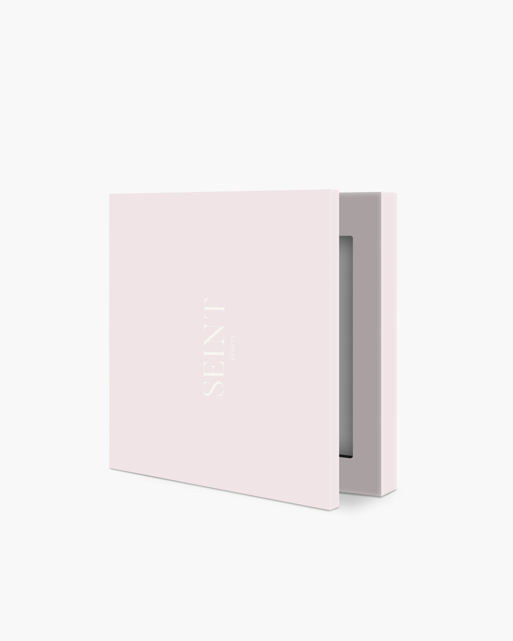 Seint IIID Palette 2 in Sundance — small blush-pink compact with tone-on-tone SEINT wordmark, lid slightly open