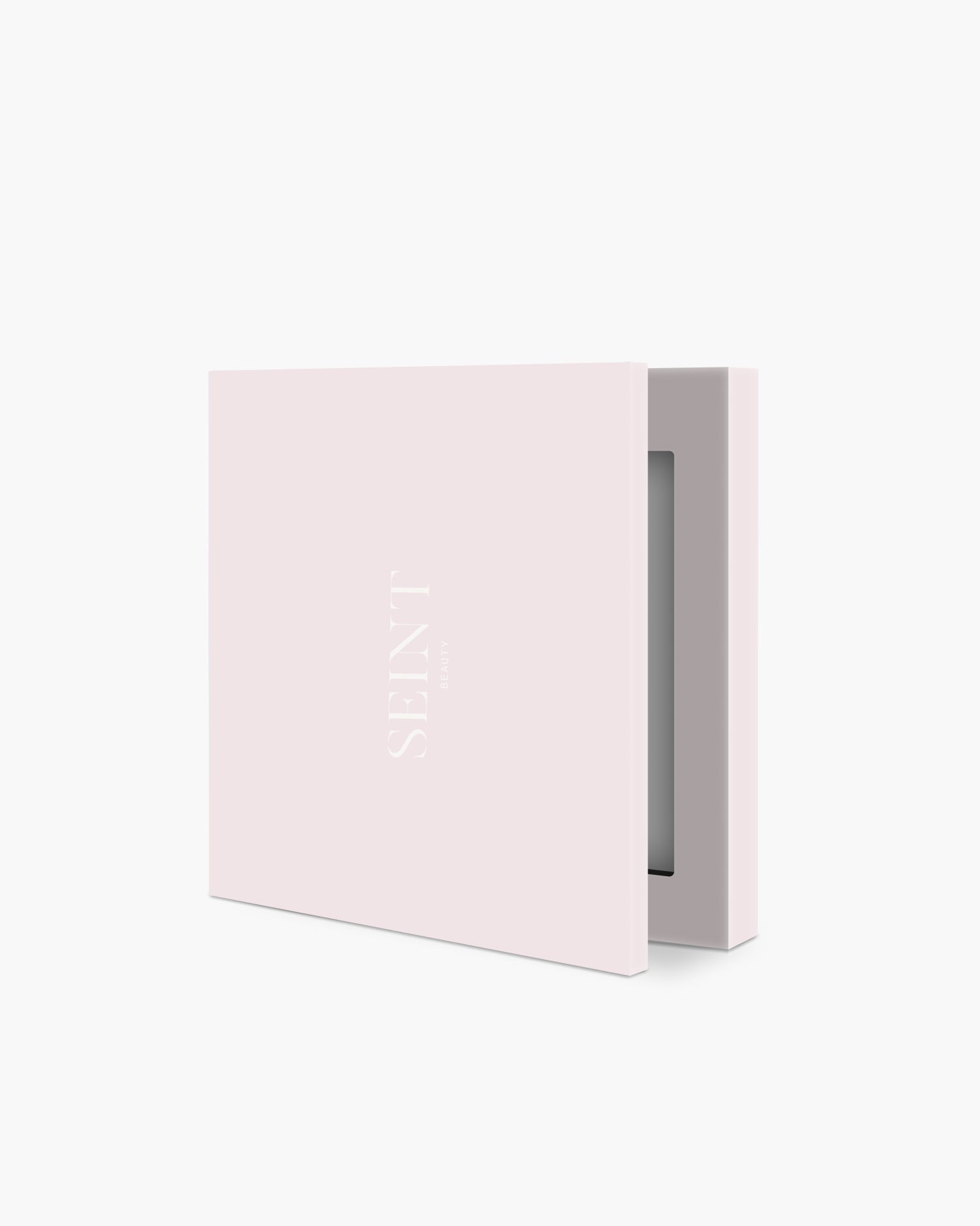 Seint IIID Palette 2 in Sundance — small blush-pink compact with tone-on-tone SEINT wordmark, lid slightly open