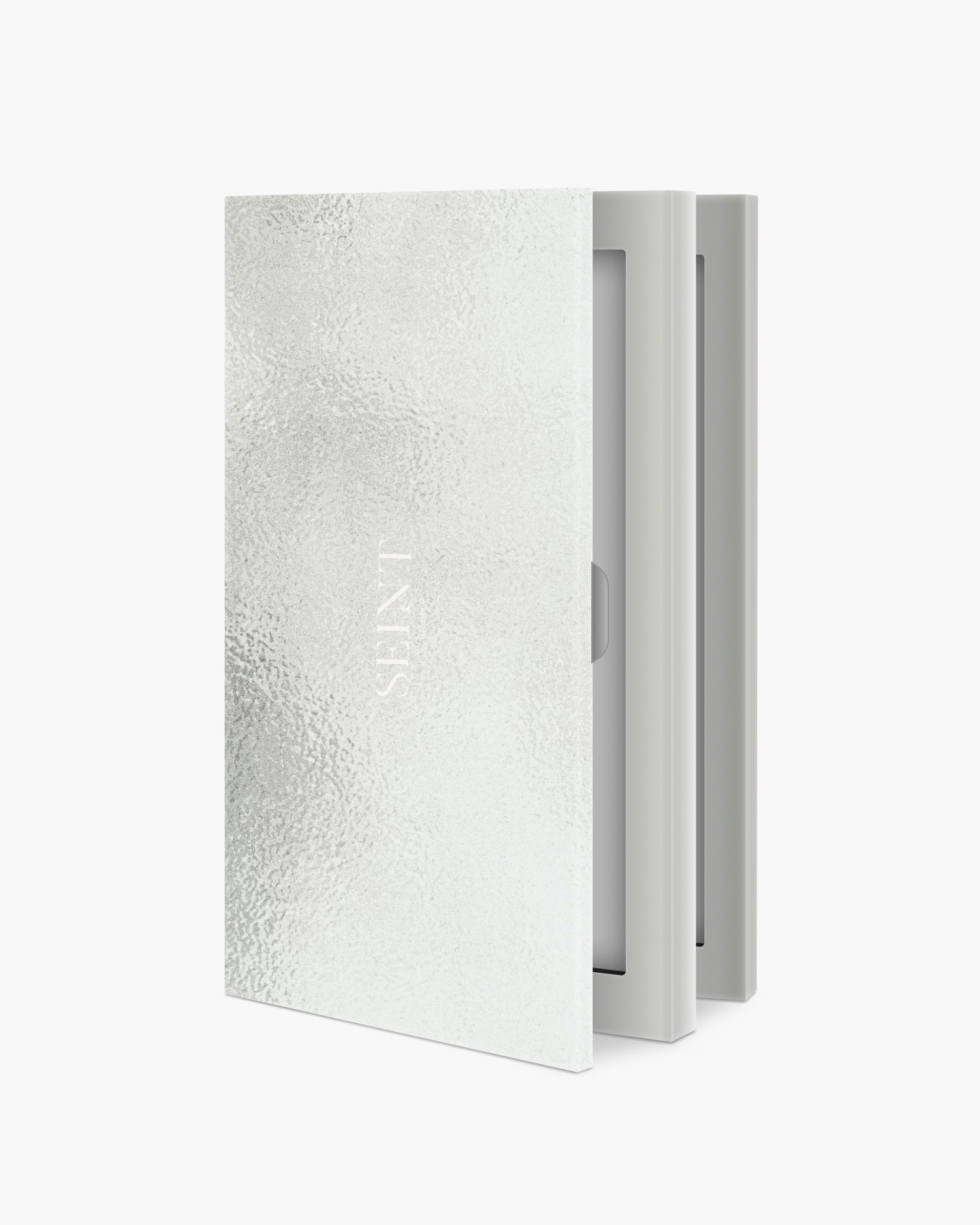 Seint IIID Palette 8 in Silver — textured metallic foil cover opening to reveal pale gray interior trays