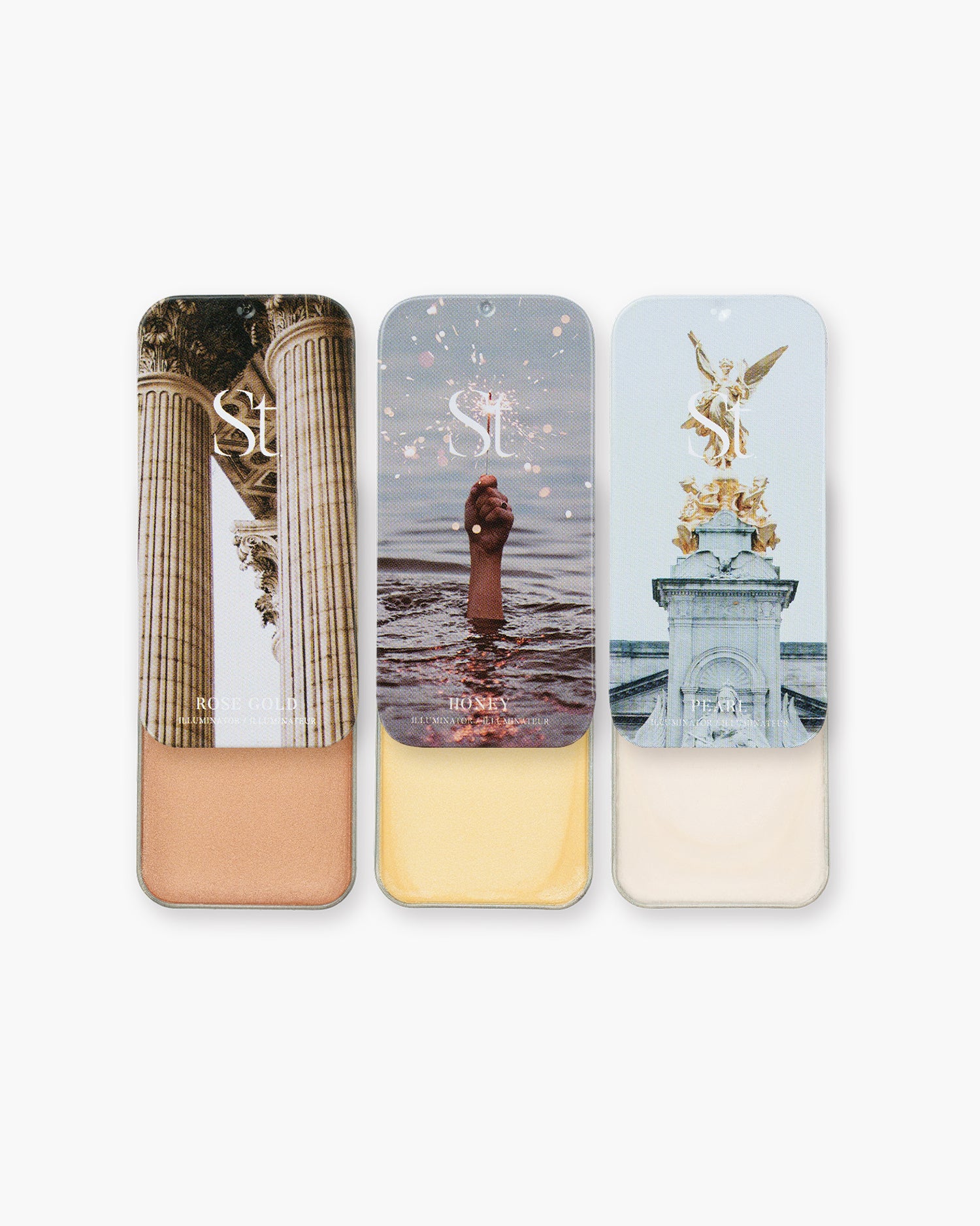 Seint Illuminator Bundle — Rose Gold, Honey, and Pearl tins slid open showing peachy-rose, golden, and ivory creams