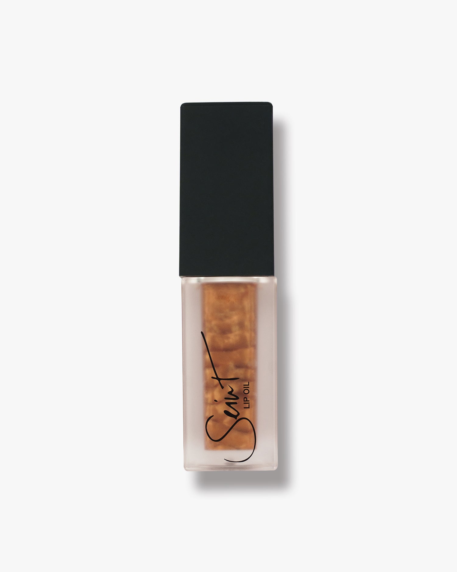 Seint Lip Oil in Cocoa with golden-bronze shimmer swirling through the frosted bottle