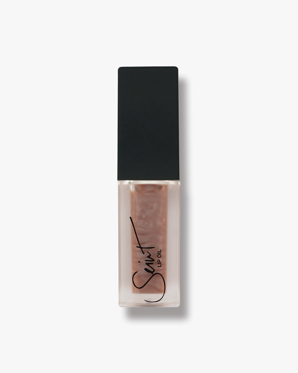 Seint Lip Oil in Salted Caramel, sheer caramel-taupe oil with a pearl swirl in the frosted bottle