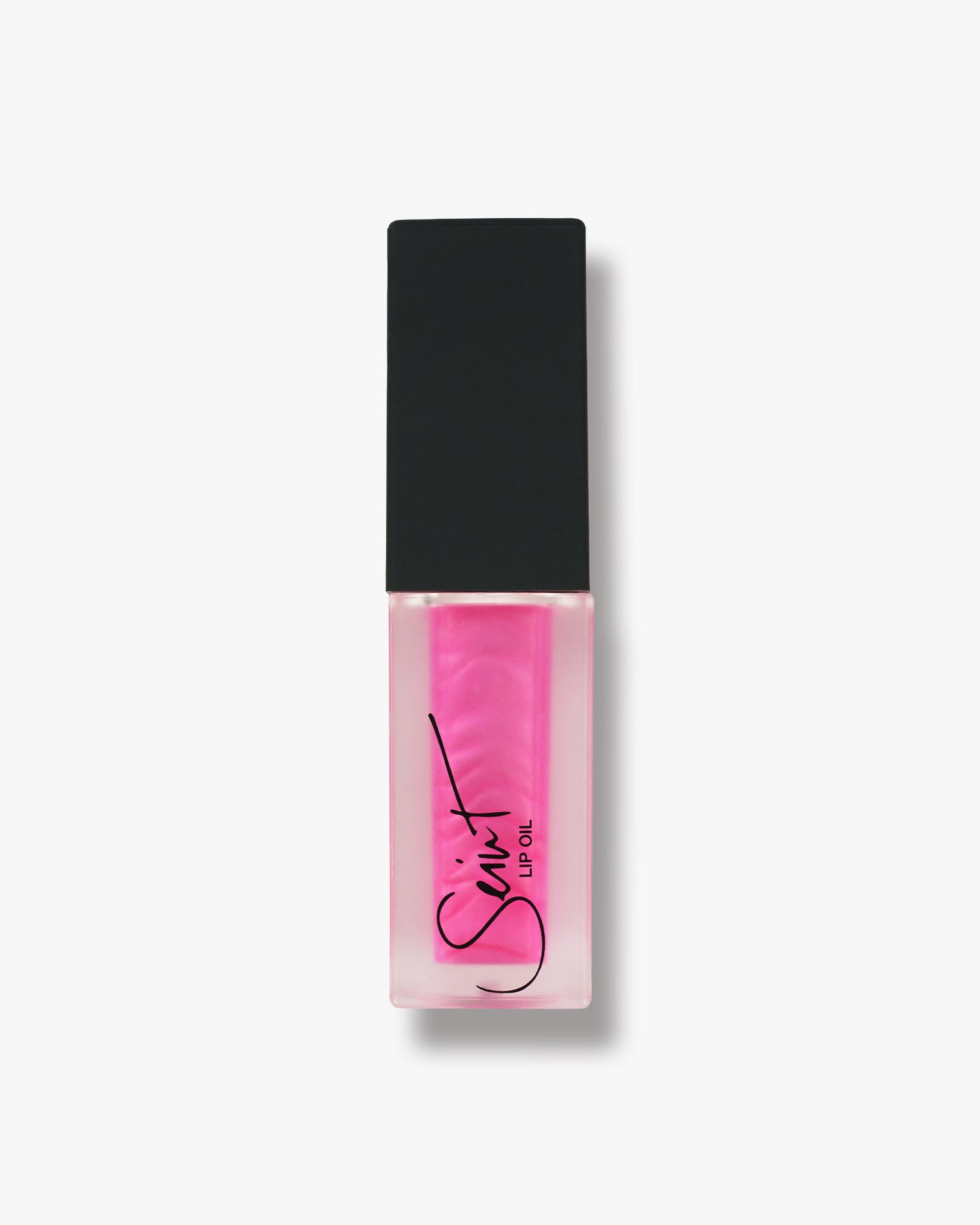 Seint Lip Oil in Sprinkles, vivid hot-pink oil in a frosted square bottle with black cap
