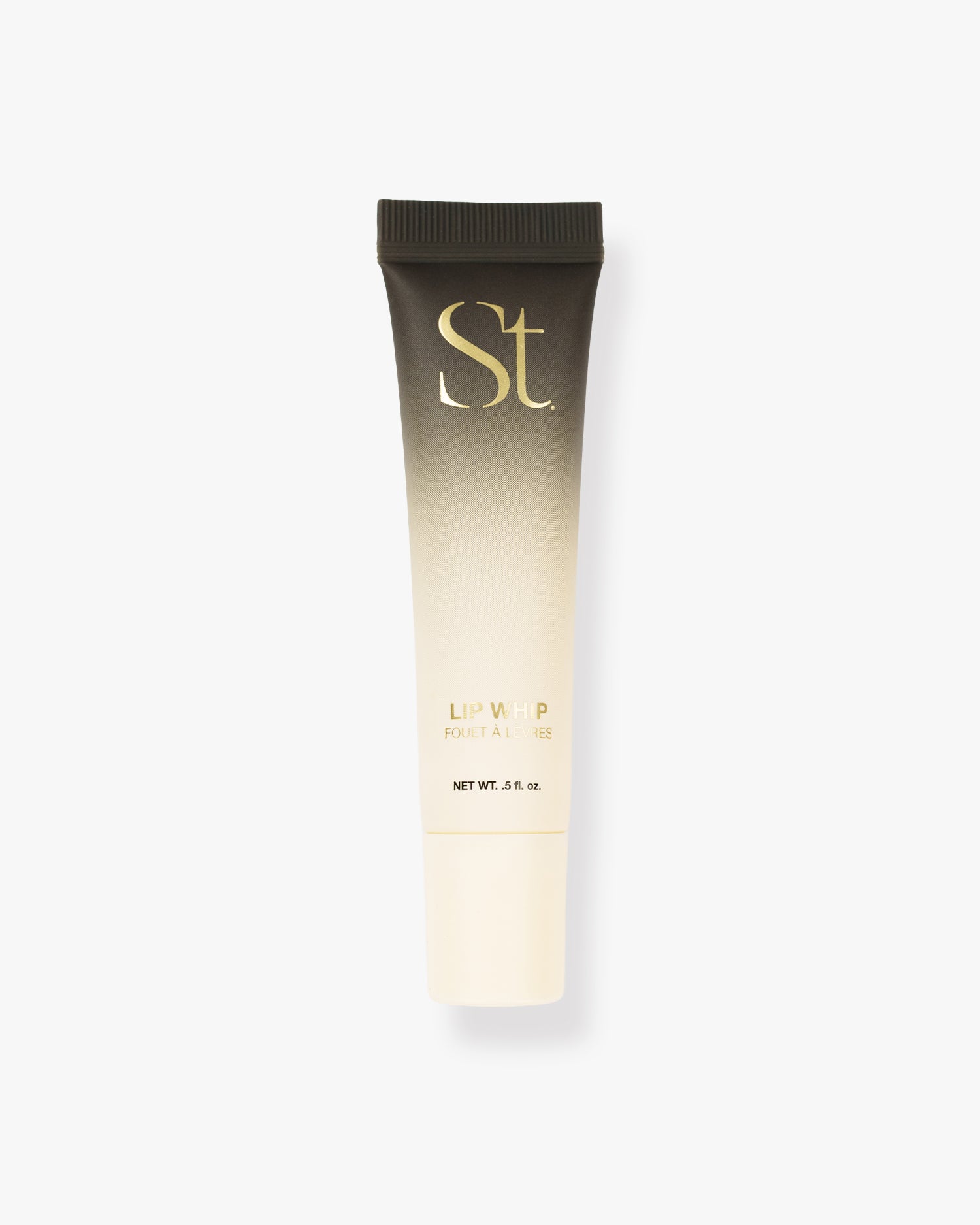 Seint Lip Whip gloss in a slim squeeze tube with black-to-cream ombre finish, gold lettering, and ribbed black cap